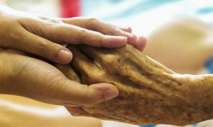 encouraging a patient in hospice care